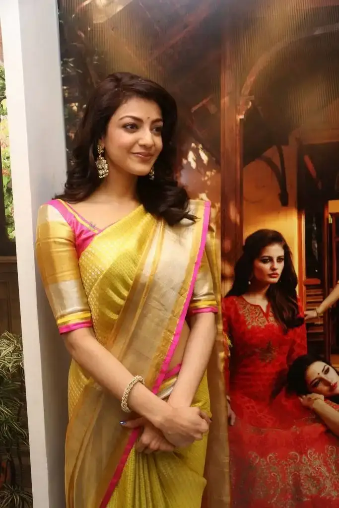 Kajal Aggarwal In Yellow Saree At Designer Store Launch